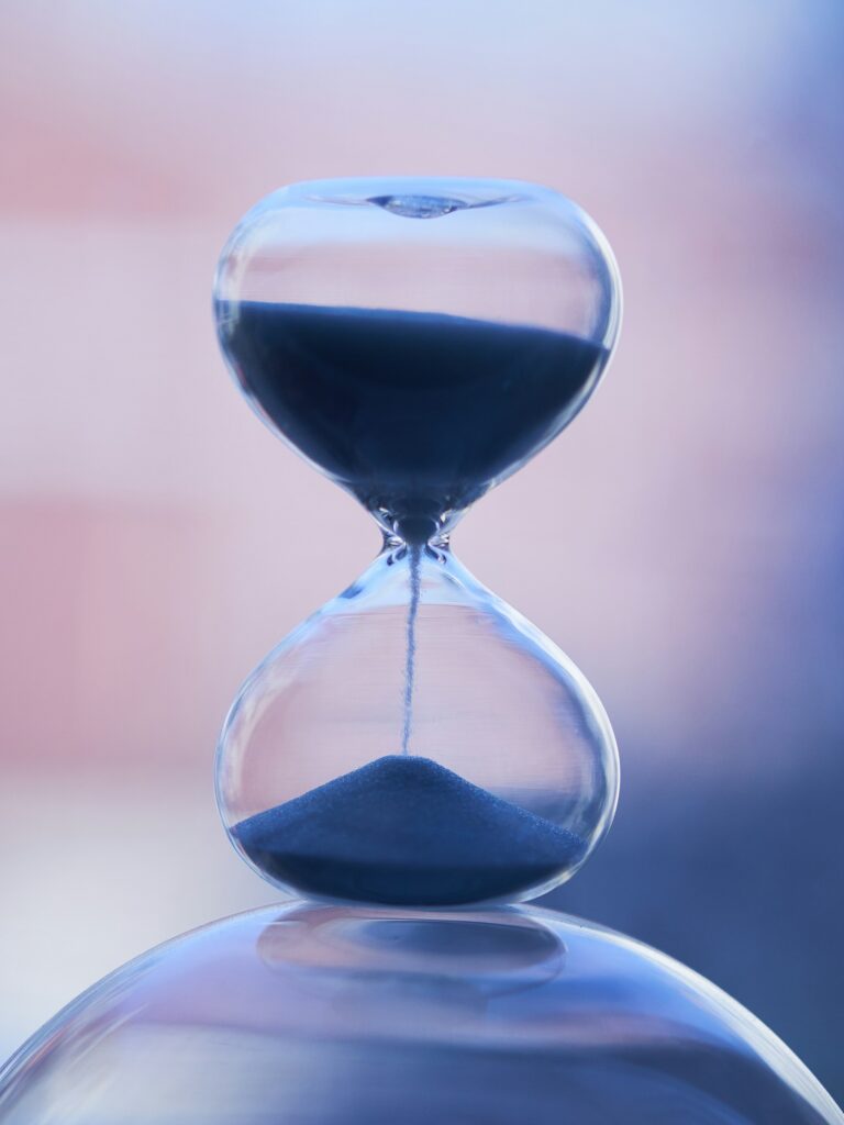 An hourglass on a table